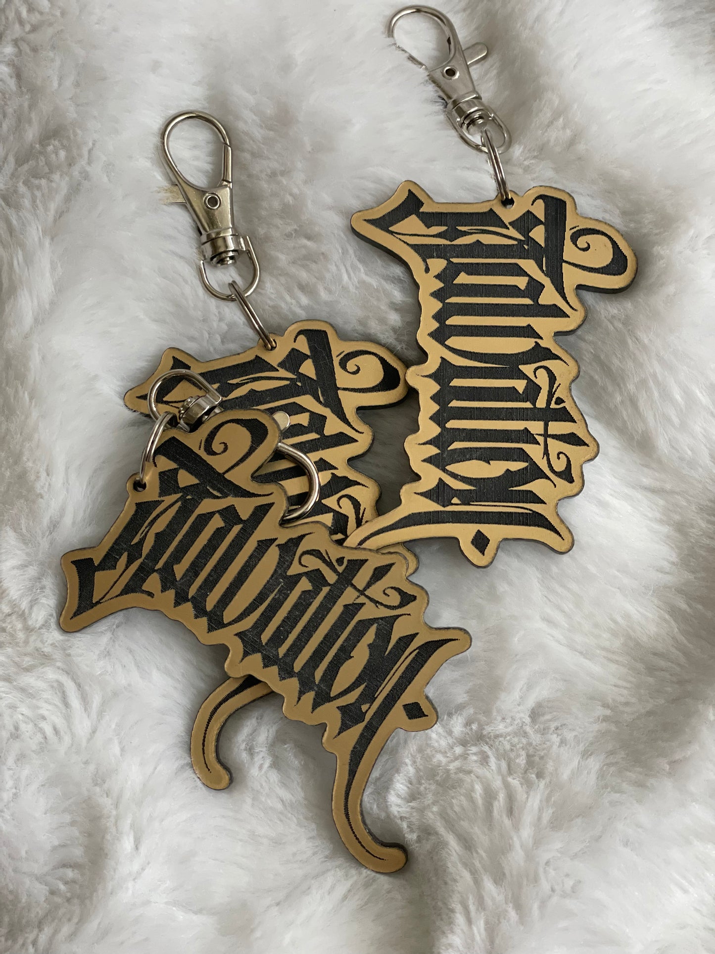 Limited Edition “Salvation” Black on Gold Keychain